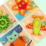 Ein Set von Holzpuzzles mit verschiedenen Tieren darauf.