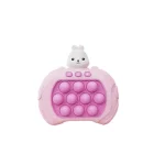 QuickPush - Rosa Reflexspielzeug mit einem Hasen darauf.
